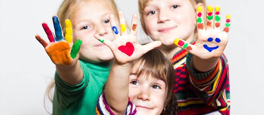 kids palying with colours